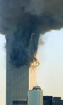 The start of the global collapse of WTC Building 2. Some tilting of the top portion can be seen in this photograph.