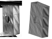 Comparison of test and nonlinear finite element analysis of the post-buckled state of a torqued box with a hole