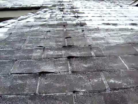 Buckling of roof shingles, causing leaks in the roof