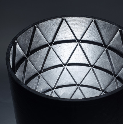 Isogrid wall on a laminated composite cylindrical shell