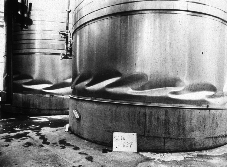 1980 Earthquake buckling of filled wine tanks