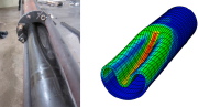 Long pipe buckling  under external pressure: test and finite element model