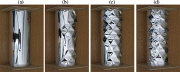 The evolution of the post-buckling pattern of an axially compressed, unstiffened cylindrical shell with increasing axial compression