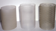 Near-perfect (middle), axisymmetrically imperfect (left) and non-axisymmetrically imperfect (right) cylindrical shells