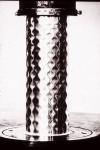buckled very thin axially compressed cylindrical shell