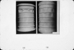 Buckled externally pressurized ring-stiffened cylindrical shells