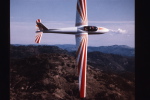 glider with locally buckled skin of the wings