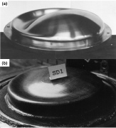 Collapsed (a) machined and (b) industrially spun steel torispherical shells with a 6% knuckle