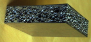 A steel foam sandwich panel tested and analyzed by Szyniszewski, et al (paper published in Thin-Walled Structures in 2012)