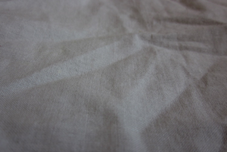First crushed and then unfolded linen handkerchief