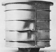 Buckled externally ring-stiffened, hydrostatically compressed cylindrical shell